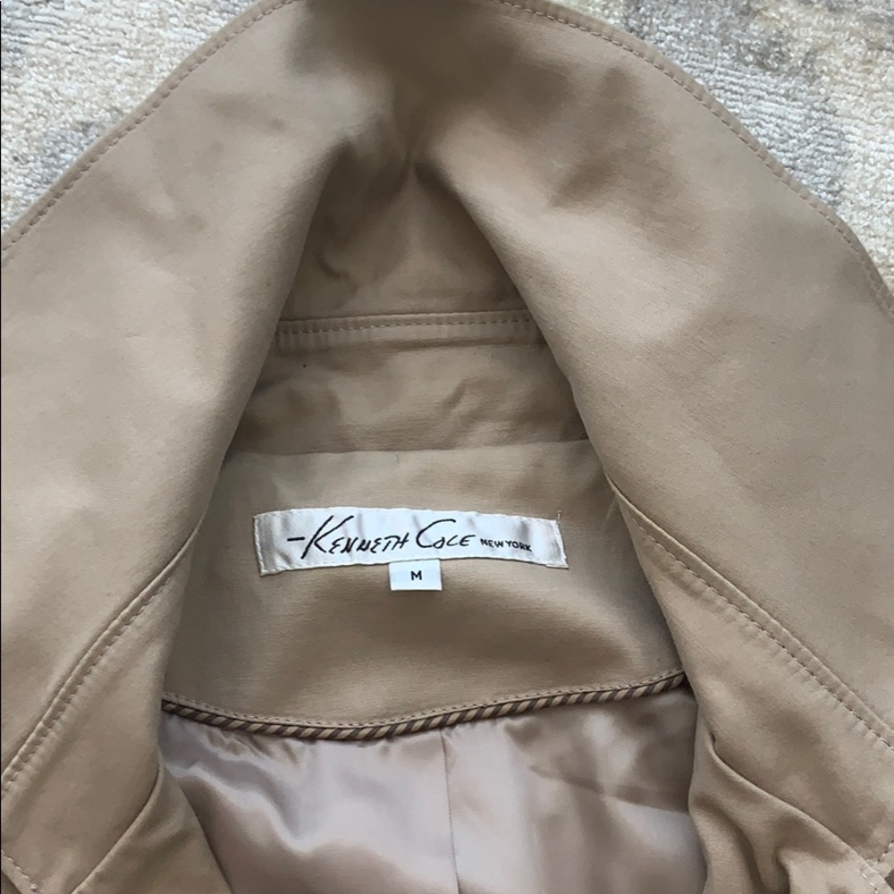 Classical trench coat- bought but never used.